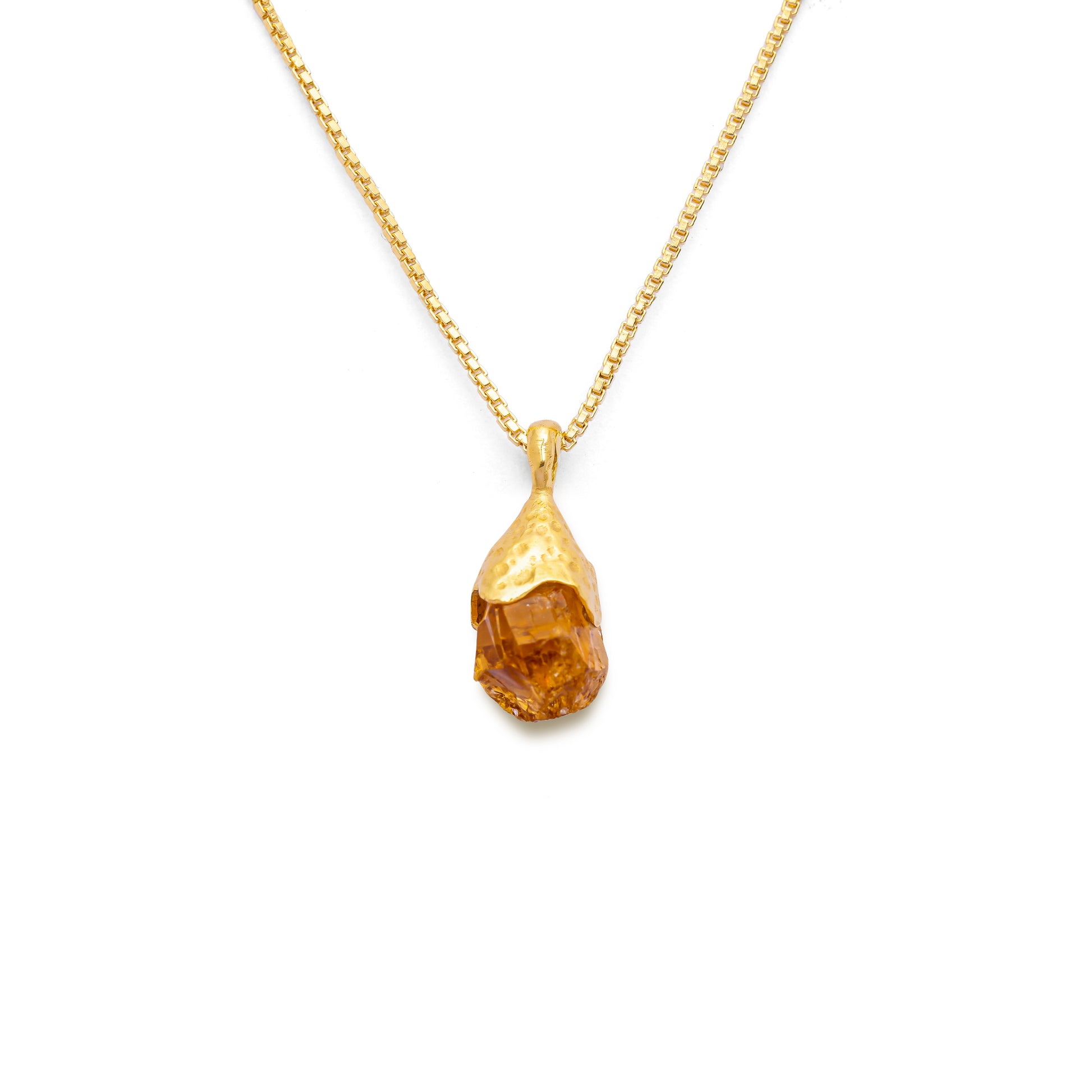 Orange citrine pendant raw nugget on a 18k gold vermeil box chain on a white background