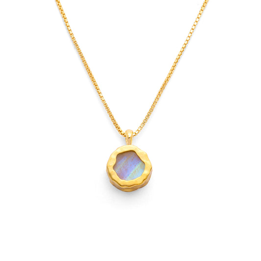 Flat round rainbow moonstone pendant on a 18k gold vermeil box chain on a white background