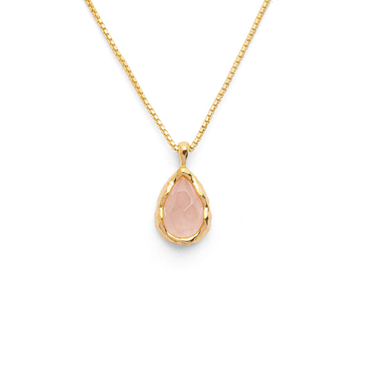 Teardrop shape pink rose quartz pendant with irregular faceting on a 18k gold vermeil box chain on a white background