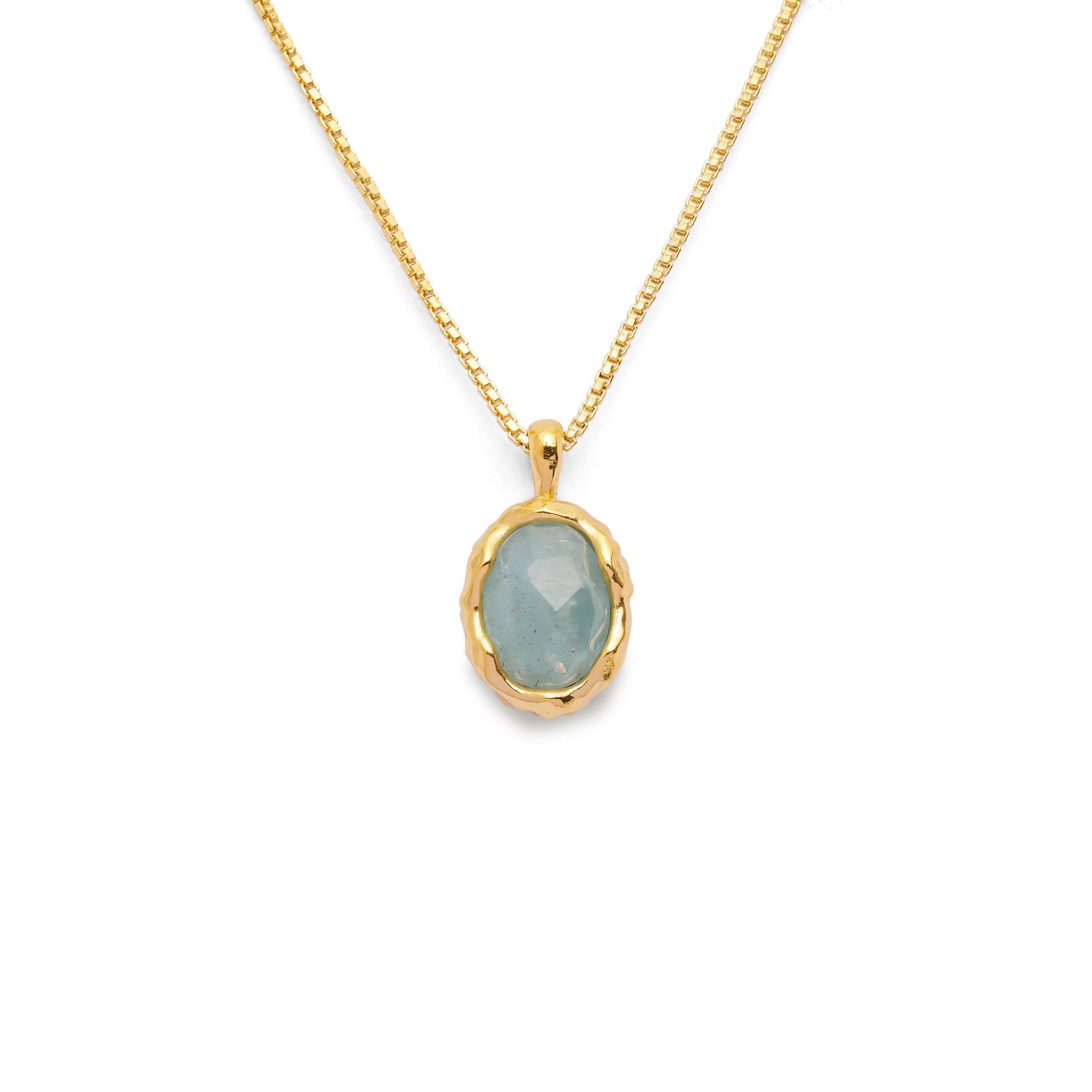 Aqua green oval aquamarine pendant with irregular faceting on an 18k gold vermeil box chain on a white background